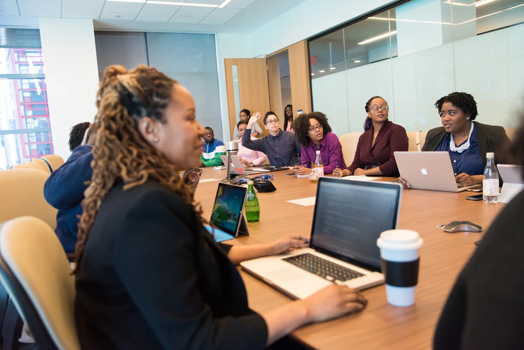 A team reviewing business information around a shared table